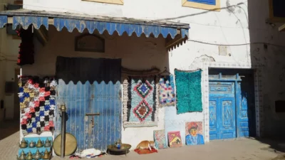 Blue and white medina streets of Essaouira with traditional doors in late spring